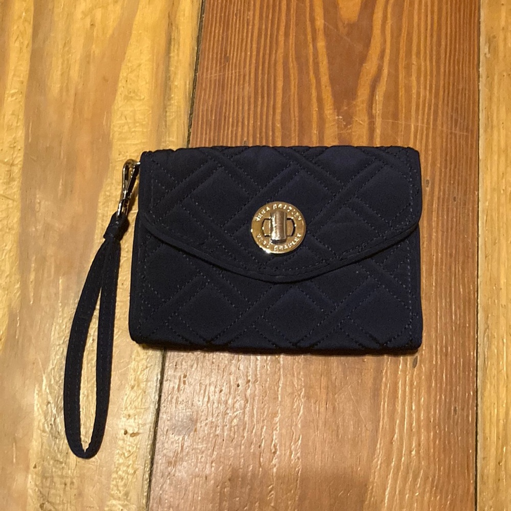 Vera Bradley black wallet/wristlet with silver lock and logo on the lock